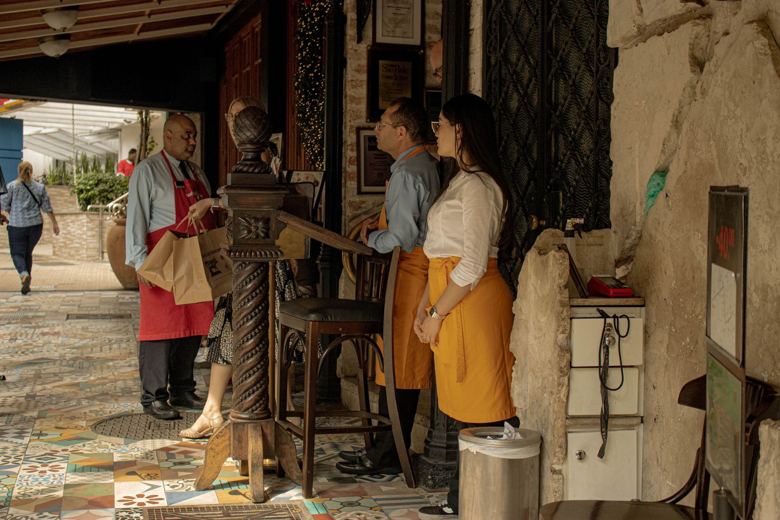 Staff greeting a guest at the door