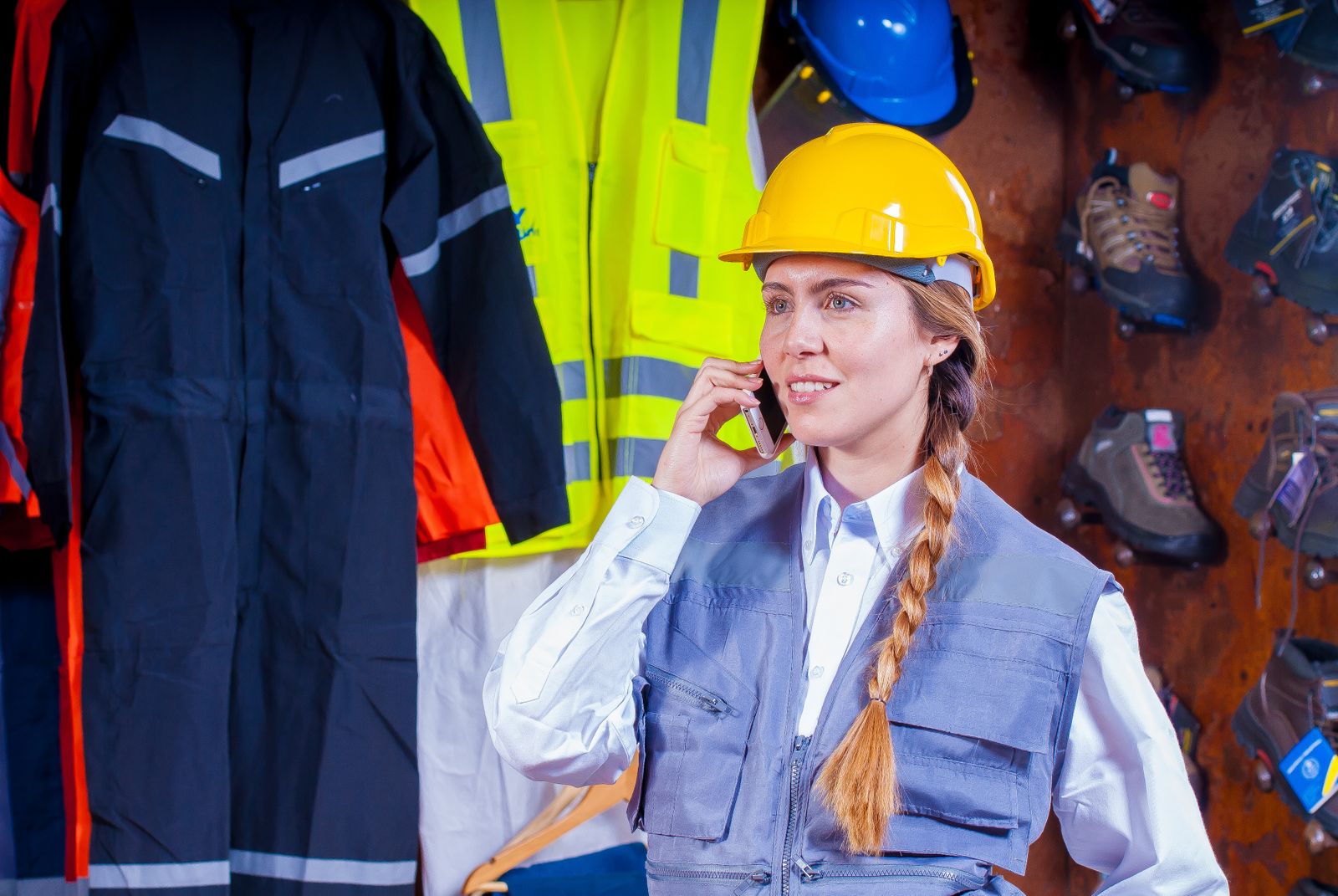 A tradesperson taking a call on the job